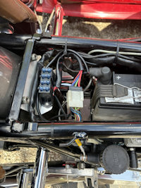 John created this separate bracket for mounting the fuse block on his Moto Guzzi California III.