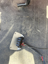 John created this separate bracket for mounting the fuse block on his Moto Guzzi California III.