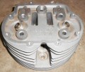 Valve guide casting is proud of the top of the cylinder head.